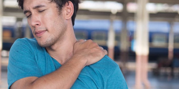 man suffer from stiff shoulder, muscle inflammation