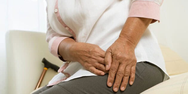 Hip pain of senior woman after waking up
