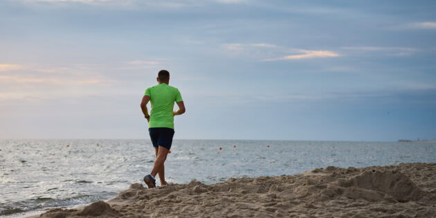 a man beach running