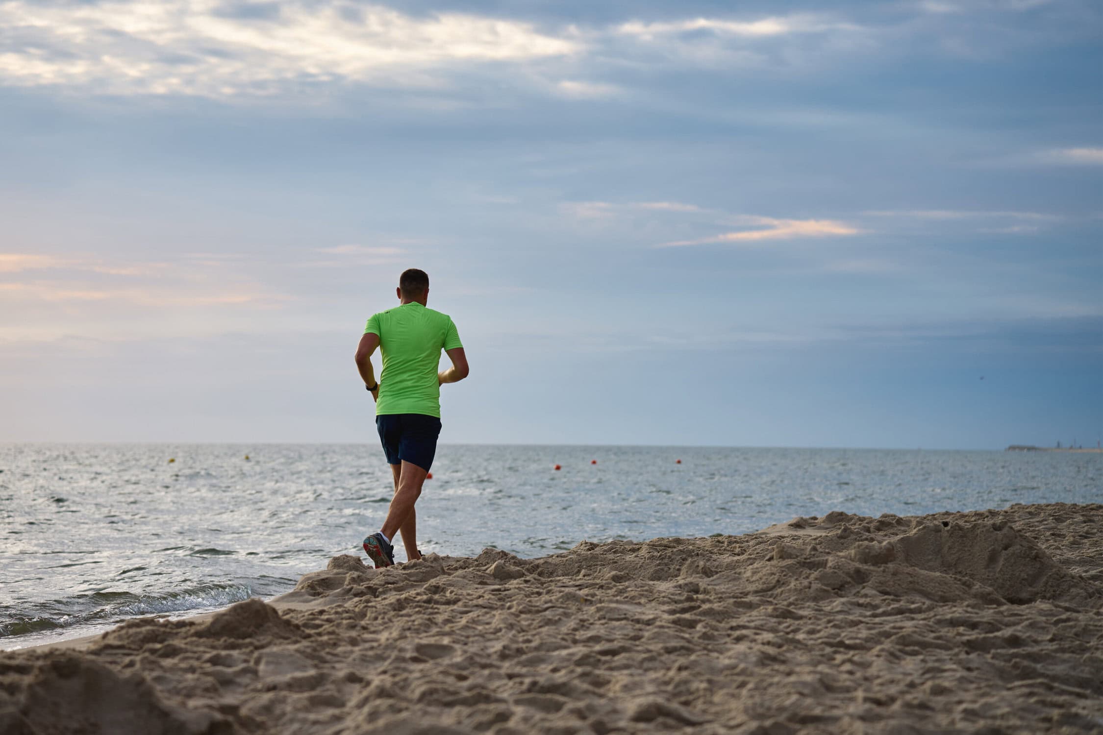 a man beach running