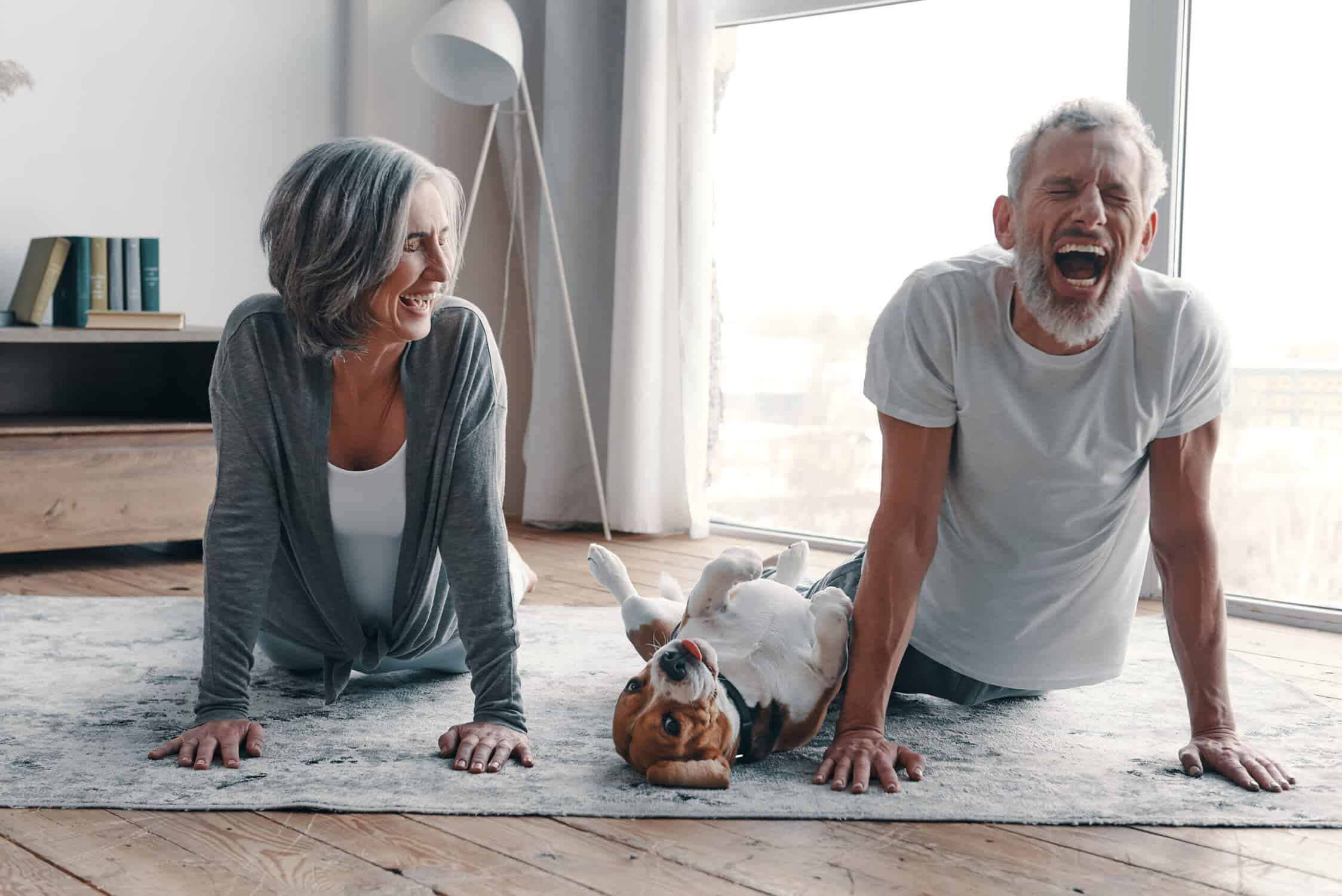 senior couple keeping active and laughing thanks to physical therapy