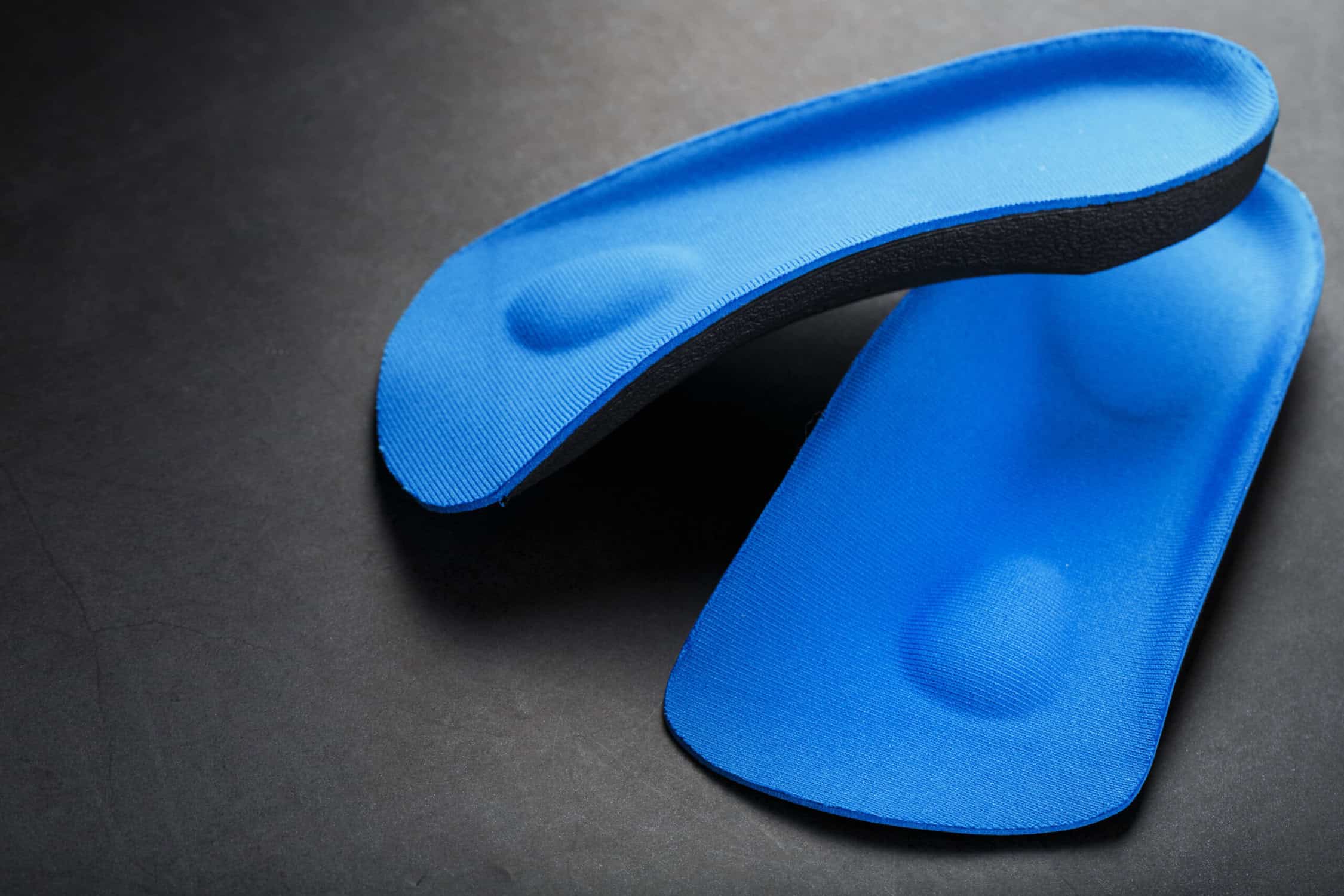 a pair of orthopedic insoles