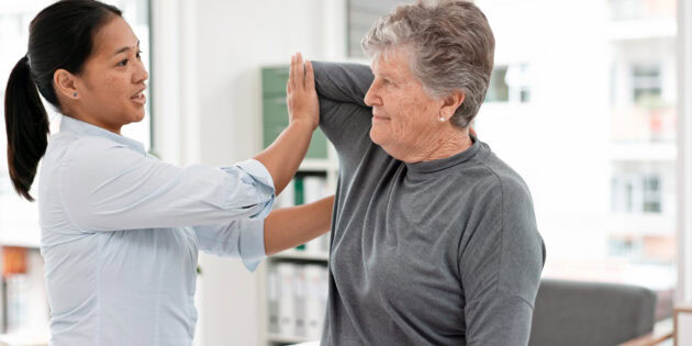 Physical therapist treating patient shoulder rotator cuff rehabilitation at Intecore Physical Therapy Southern California