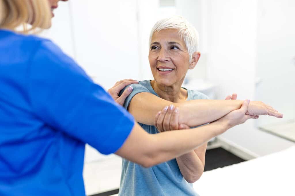Physical therapist guiding patient through shoulder replacement rehabilitation at Intecore Physical Therapy Southern California