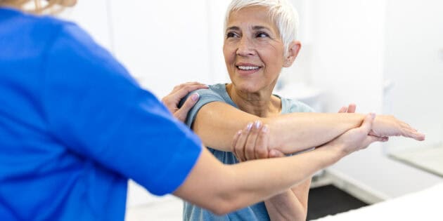 Physical therapist guiding patient through shoulder replacement rehabilitation at Intecore Physical Therapy Southern California