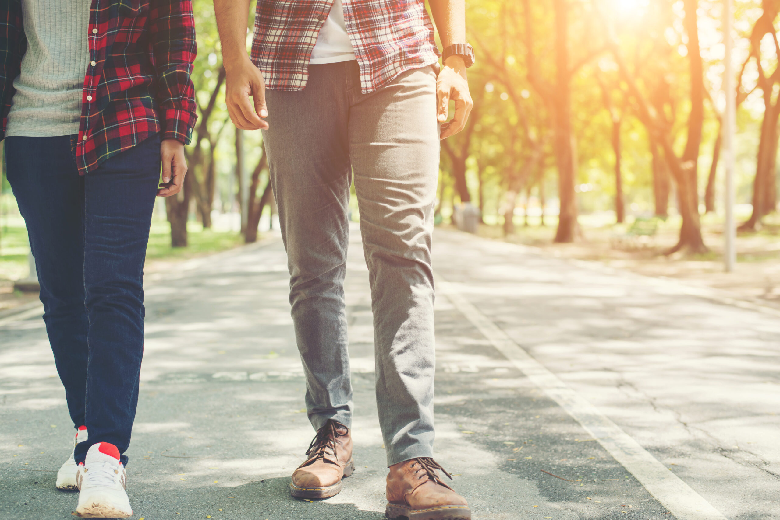 young couple walking together in the park.